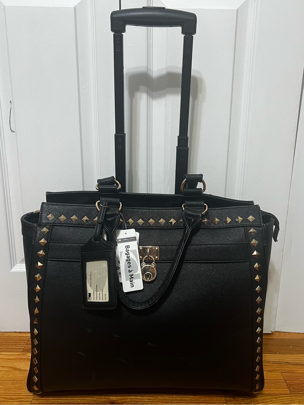 Cabrelli & Co. rolling briefcase carry on bag black with gold accents